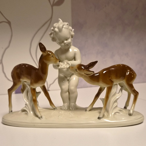Porzellanfigur kind mit zwei - kind,