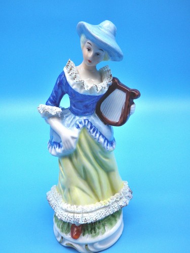 Porzellanfigur frau musikerin - porzellanfigur,