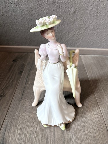 Porzellanfigur dame auf bank - dame,